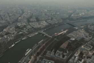 An aerial view of paris and the seine river.