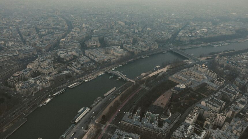 An aerial view of paris and the seine river.