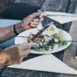 person holding kitchek knife