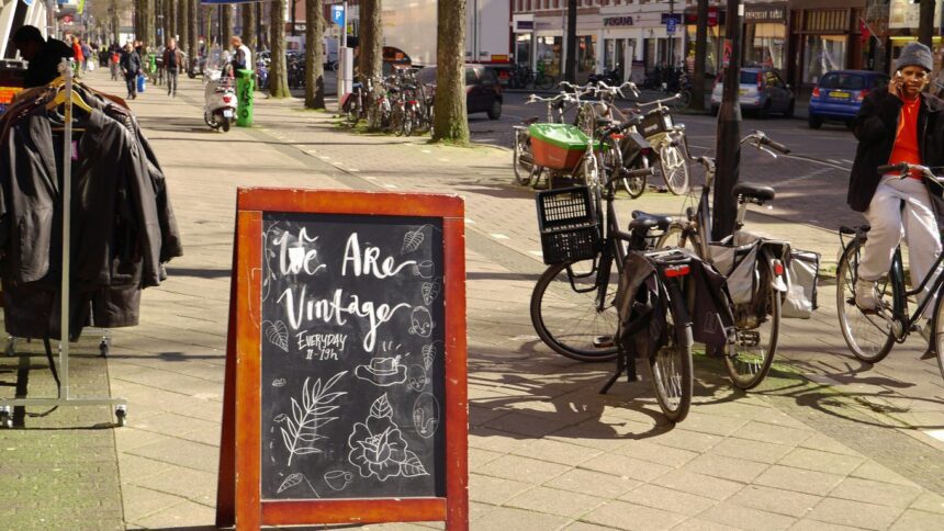 black city bike parked beside green bicycle during daytime