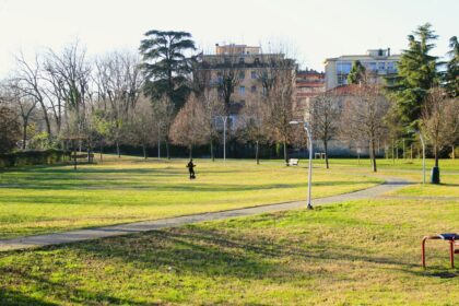 a park with a few people walking around it